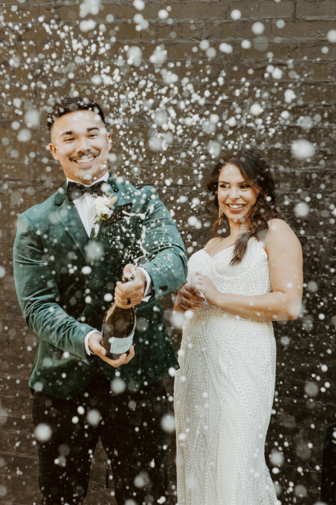 champagne showers at elegant modern wedding
