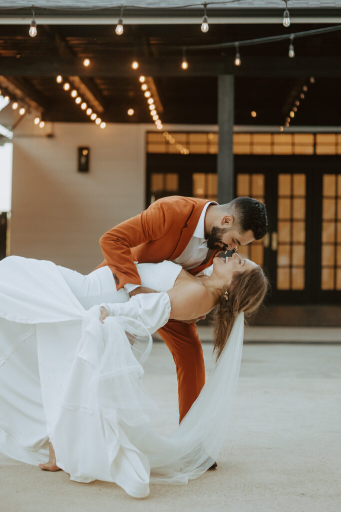 bride and groom dancing at the Emerson venue in Texas