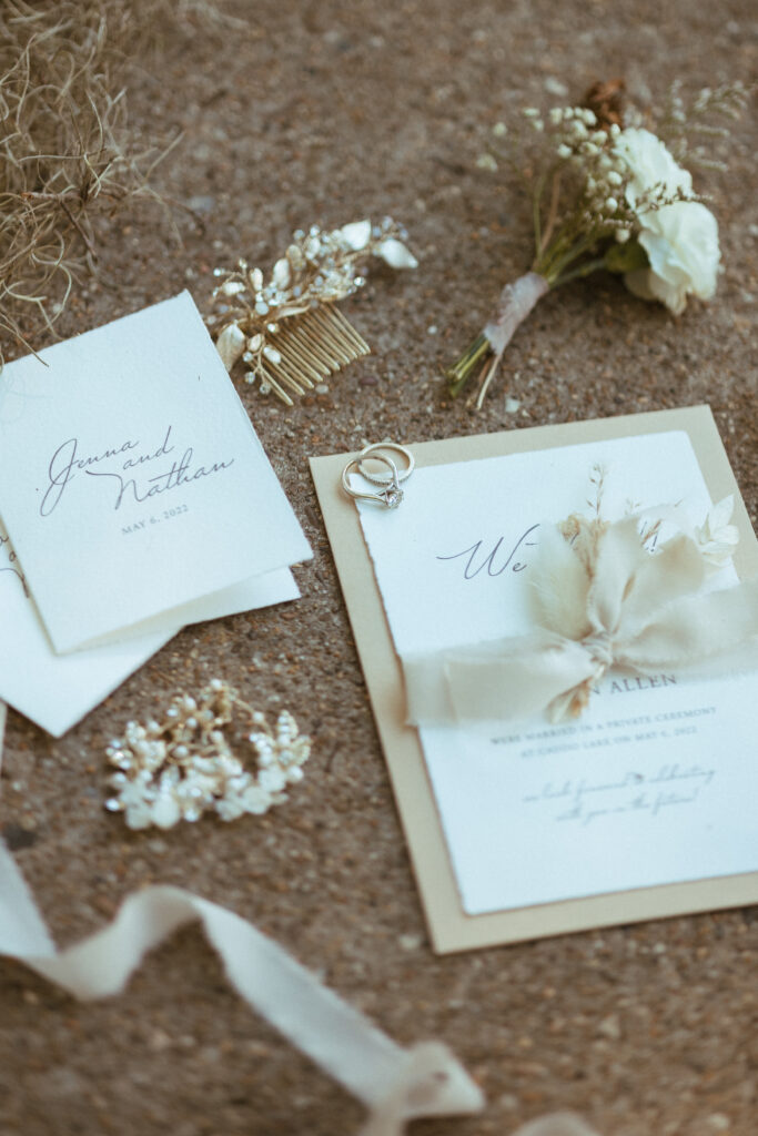 wedding invitation, vow books, boutonniere, bridal accessories