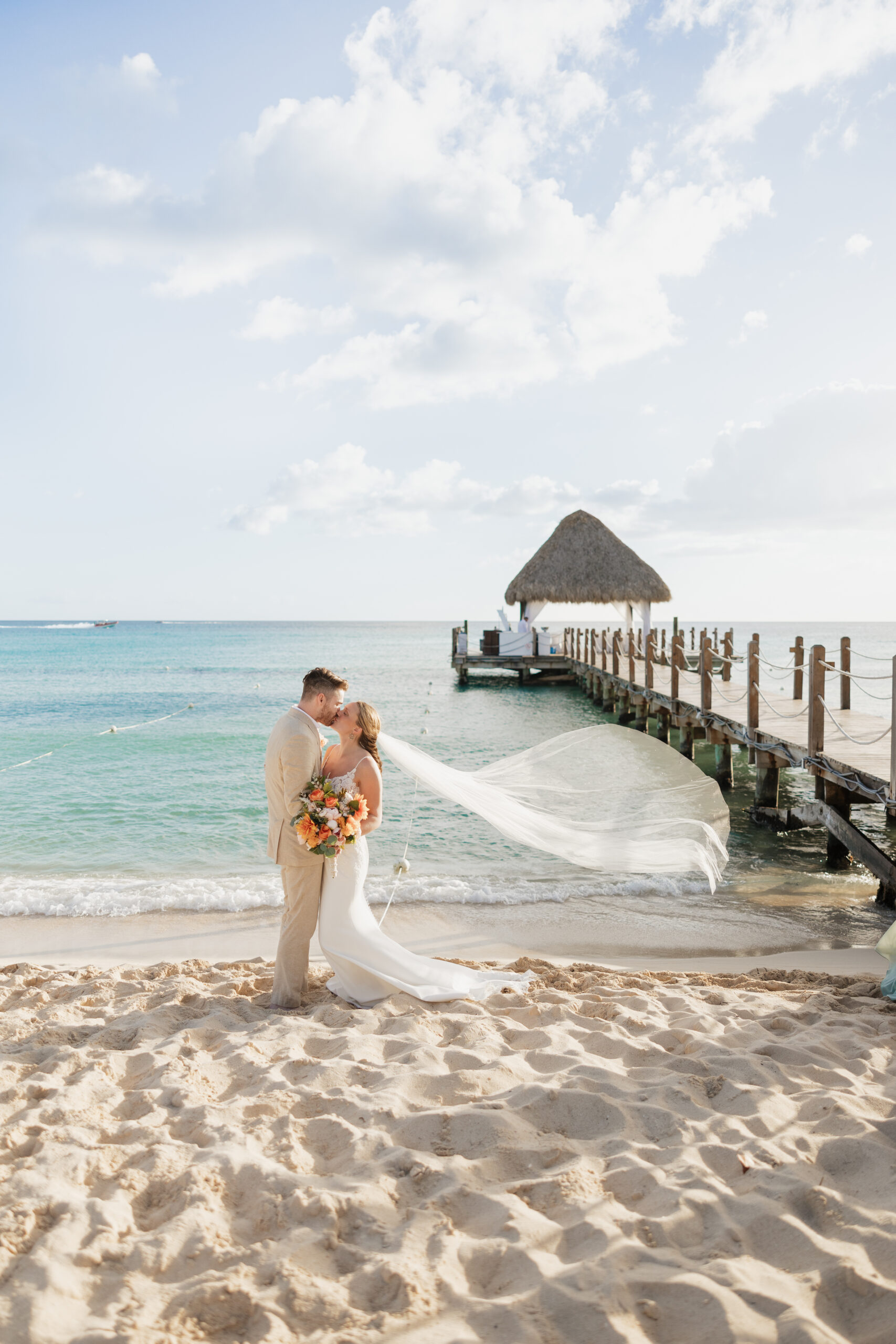 Husband and Wife on beach in Punta Cana, Dominican during destination wedding