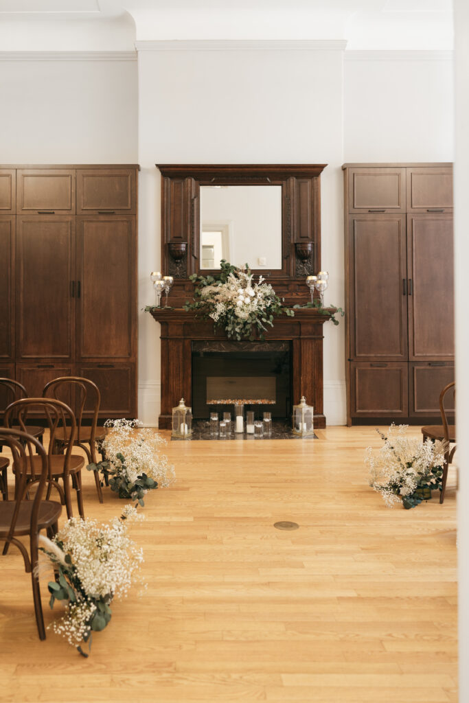 The Halifax Club wedding venue featuring ceremony site with fireplace