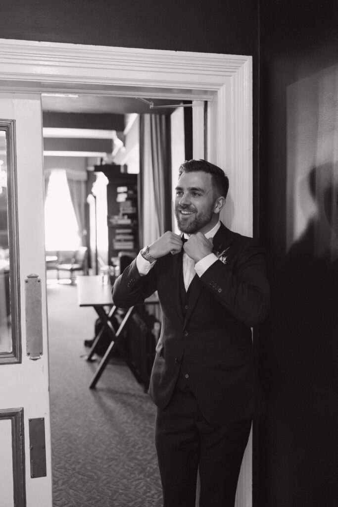 Groom getting ready at the Halifax Club