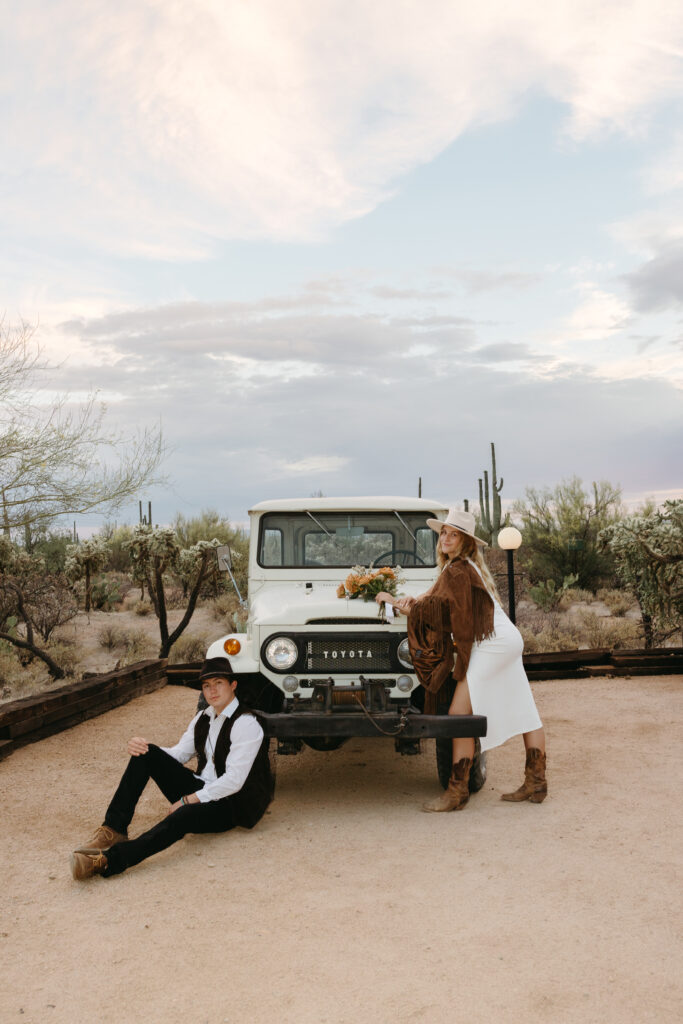 Desert adventure elopement in Tucson, Arizona at the Joshua Tree House wedding venue featuring a vintage car Wedding and Elopement Photographer